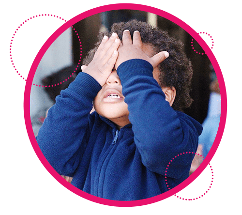 Young child covering their eyes after having been exposed to abuse. Violence has a profound impact on the development of children. If your child has been exposed to violence and abuse in any form, therapy for childhood trauma in Los Angeles is here to help them process those emotions.