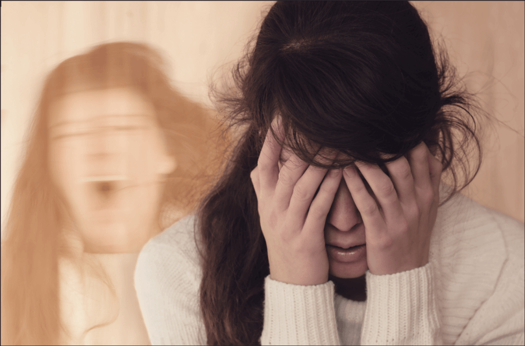 Young woman in the foreground with her hands on her head while another version of her screams behind her representing someone with a Dissociative Disorder who would benefit from Therapy for Trauma in Pasadena, CA.  