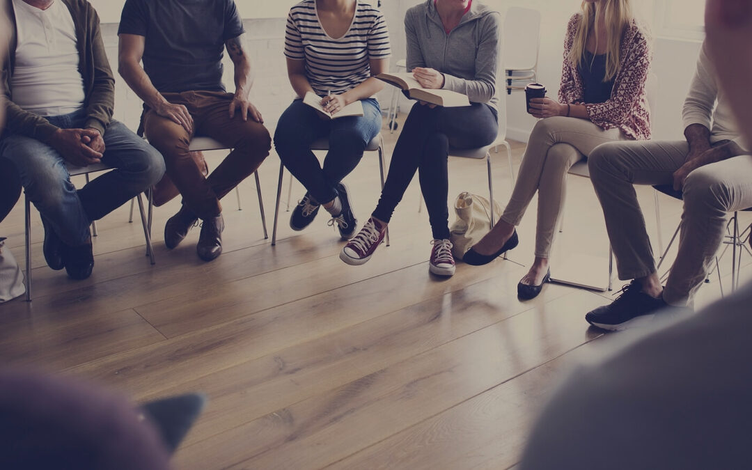 Group of diverse individuals sitting together participating in a group therapy session. If you are looking to connect with people who truly understand your challenges, Group Therapy in Pasadena, CA may be just the right fit.